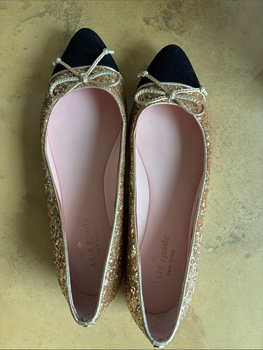 kate spade Gold Glitter Ballet Flats with Black Cap-Toe and Bow